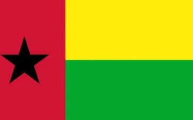 Flag of Guinea-Bissau with yellow and green stripes and red section with black star.