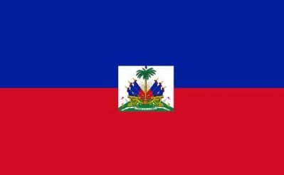 Flag of Haiti with blue and red stripes and coat of arms in the center.