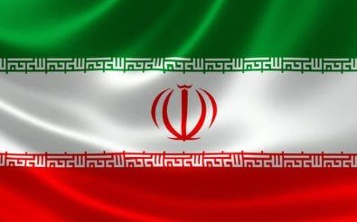 Flag of Iran with green, white, and red stripes and national emblem.