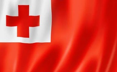 Flag of Tonga with red field and white square containing red cross.