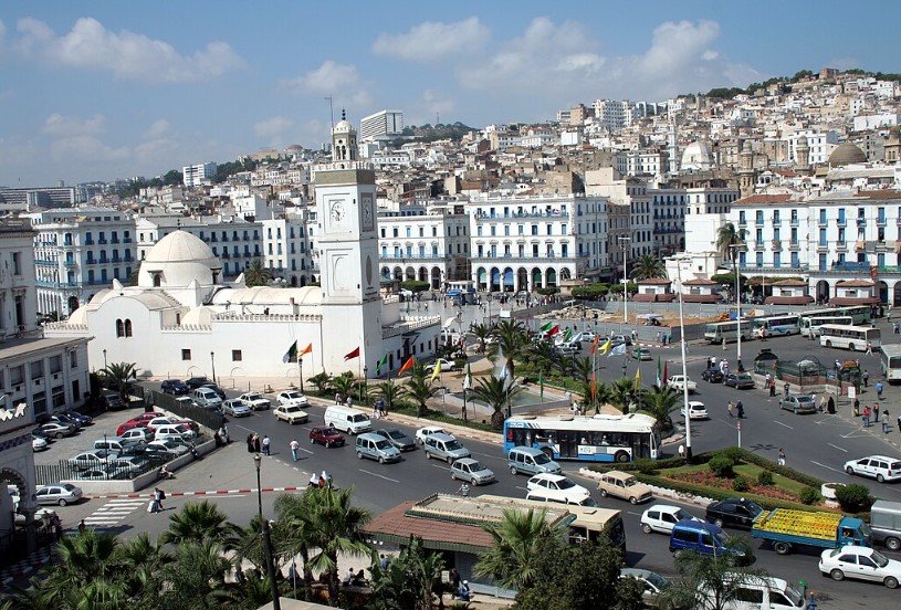 The Casbah of Algiers with narrow alleys and Mediterranean views. 