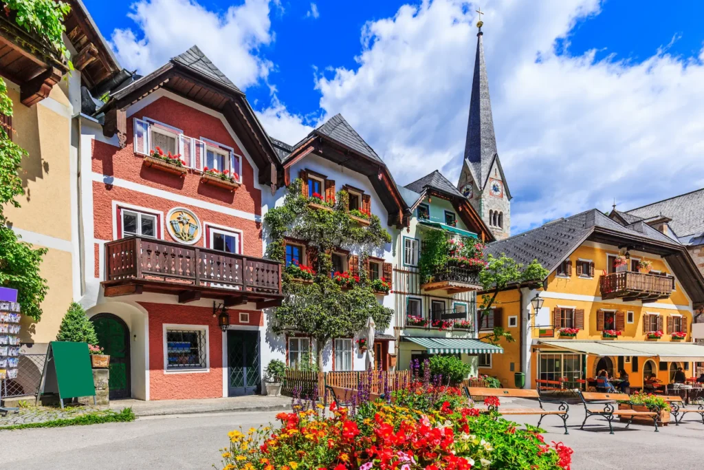 Colorful village buildings in Hallstatt, Austria with clear skies and clean streets