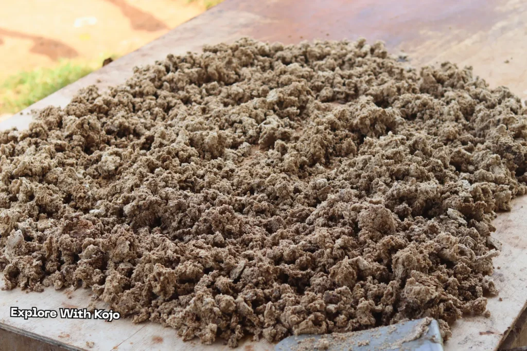 Crumbled African black soap drying under the sun in Tamale, Ghana