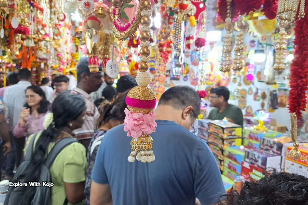 Vendors selling fresh flower garlands for Deepavali in Little India Singapore.