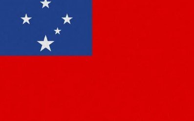 Flag of Samoa with red field and blue rectangle with white stars.