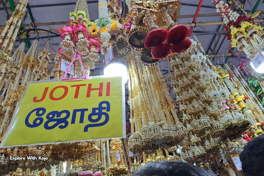 Flower garlands and golden ornaments at Jothi store in Little India Singapore