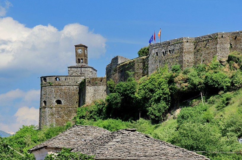 Gjirokastër Castle overlooking the stone-roofed old town in southern Albania.