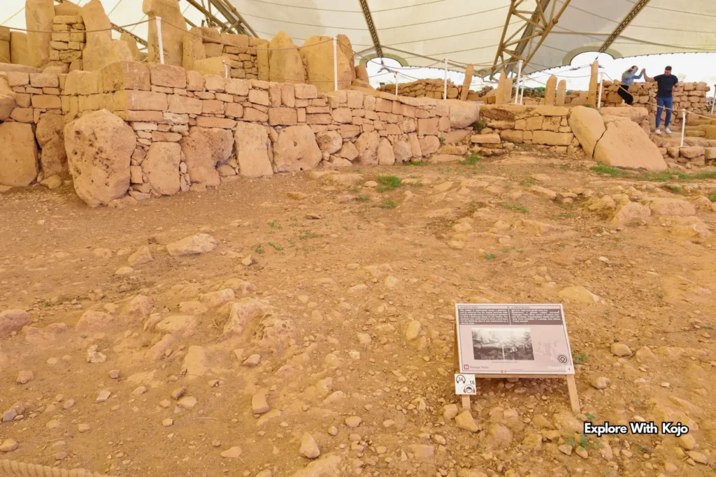 Heritage Malta information board explaining history and excavation of Ħaġar Qim temple