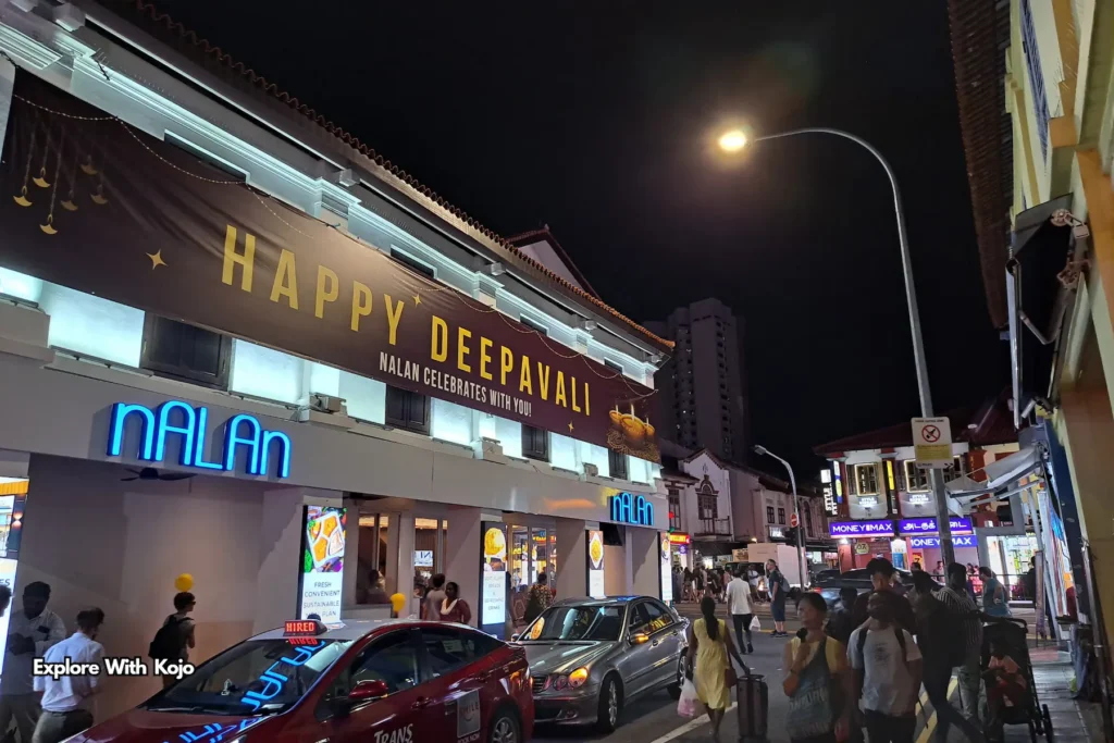 Restaurant facade with a large Happy Deepavali banner above Nalan Restaurant Singapore.