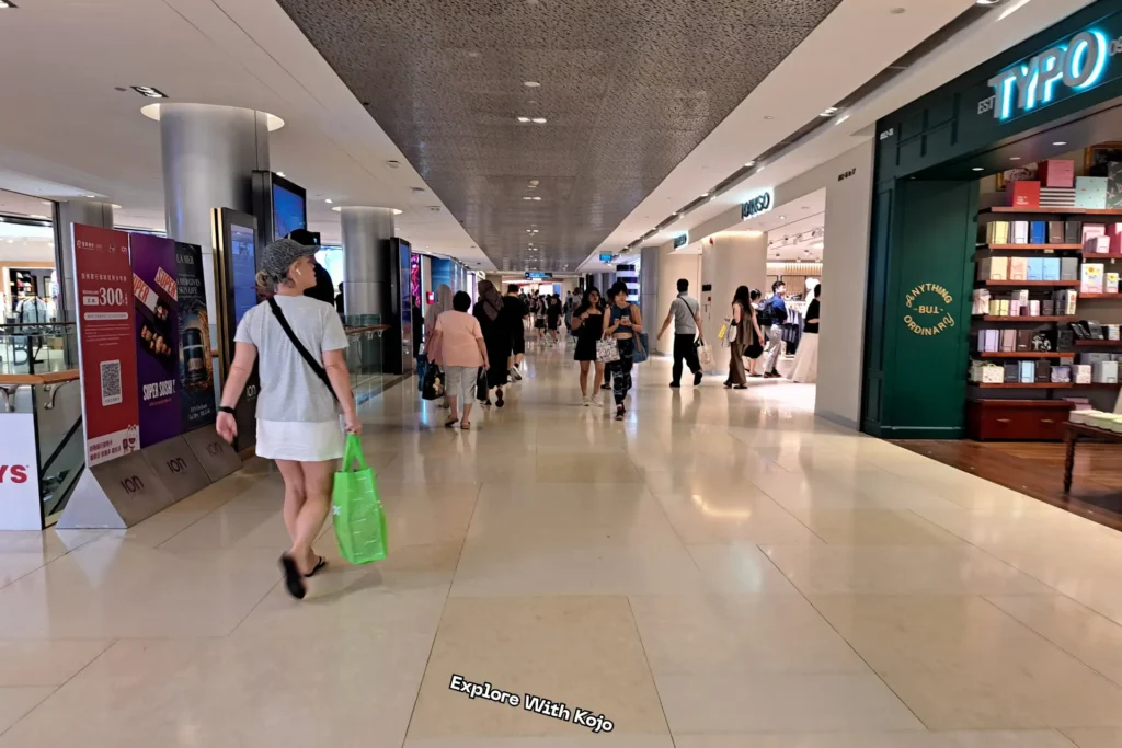 Shoppers walking inside ION Orchard Mall on Orchard Road Singapore