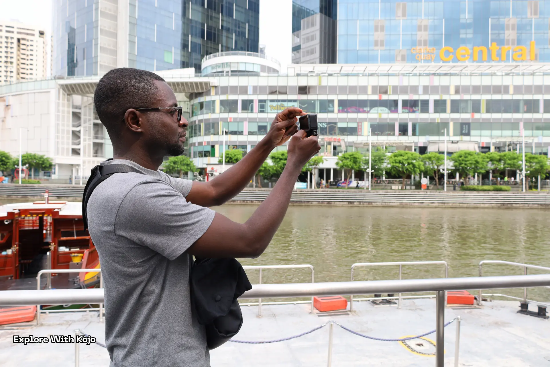 kojo-enoch-explore-with-kojo-clarke-quay-singapore Kojo Enoch filming at Clarke Quay in Singapore for Explore With Kojo.