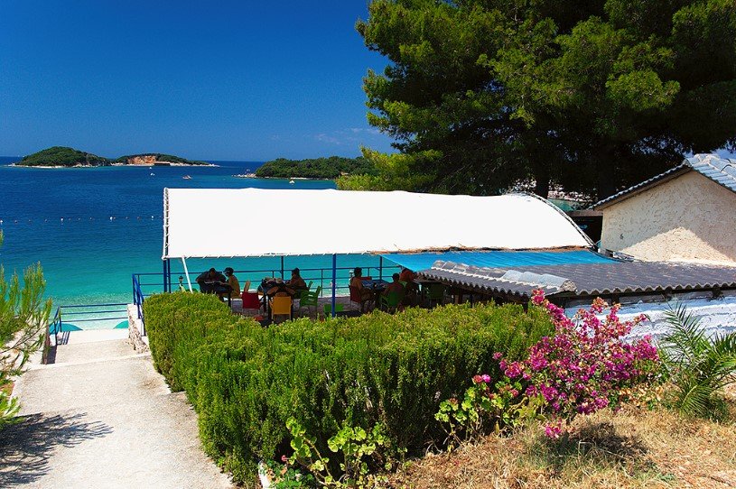 Ksamil Beach near Saranda with turquoise water and small islets.