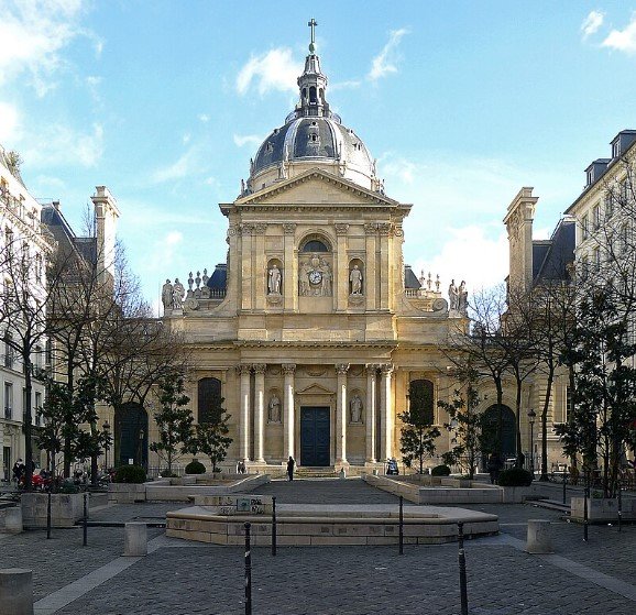 Café terraces and old streets in the Latin Quarter of Paris.