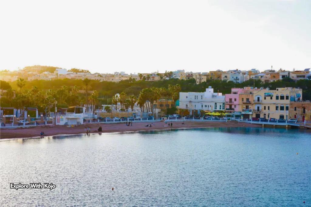 Colourful Maltese seaside village at sunset