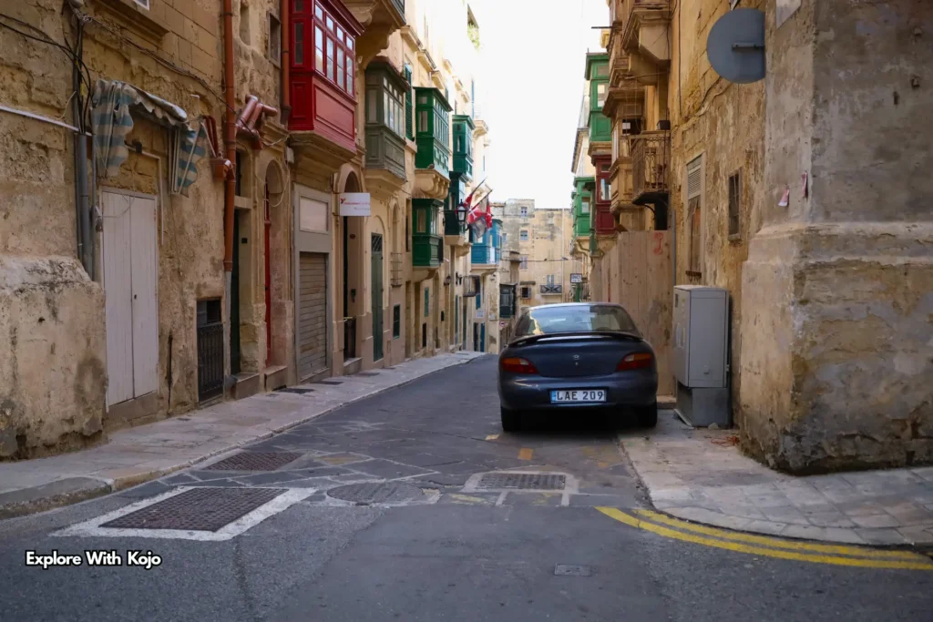 Street with traditional Maltese balconies in Valletta