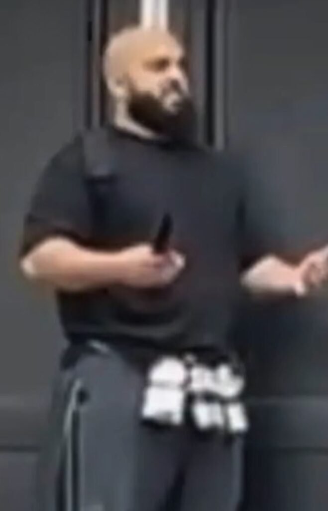 Suspect in the Manchester synagogue attack wearing a bulletproof vest and holding a knife, October 2025.