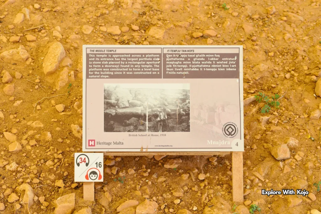 Heritage Malta sign describing Mnajdra’s Middle Temple with historical photograph from 1910 excavation