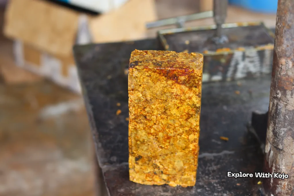 Molded African black soap block after drying, ready for packaging in Ghana
