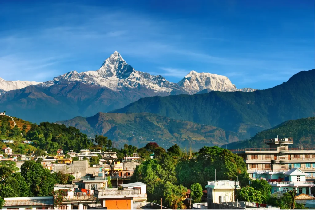 Beautiful view of the Himalayas with a Nepali town in the foreground.