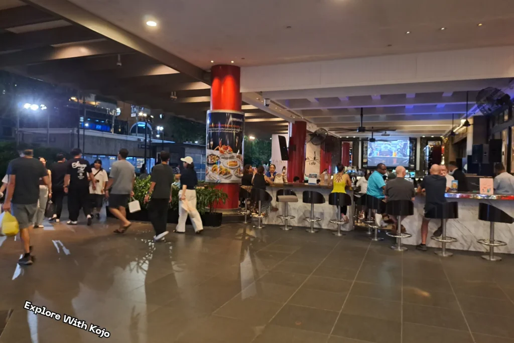 Crossroads Café at Marriott Tang Plaza Hotel along Orchard Road with people enjoying nightlife and drinks