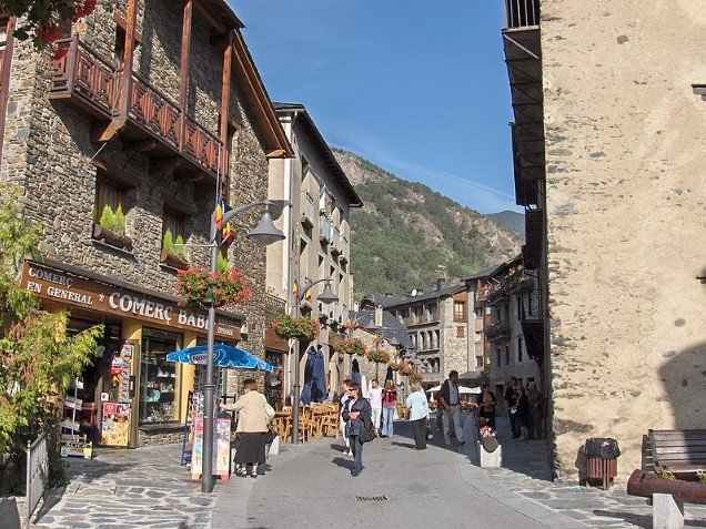 Stone houses and mountain backdrop in the village of Ordino Andorra.