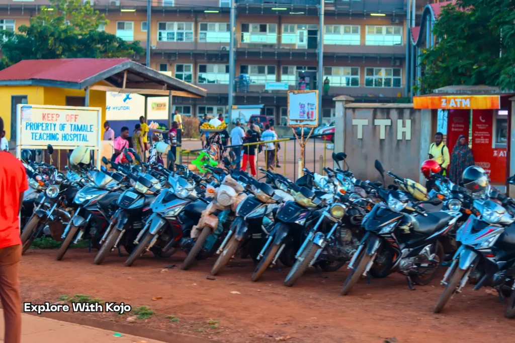 Dozens of parked motorbikes outside Tamale Teaching Hospital in Ghana