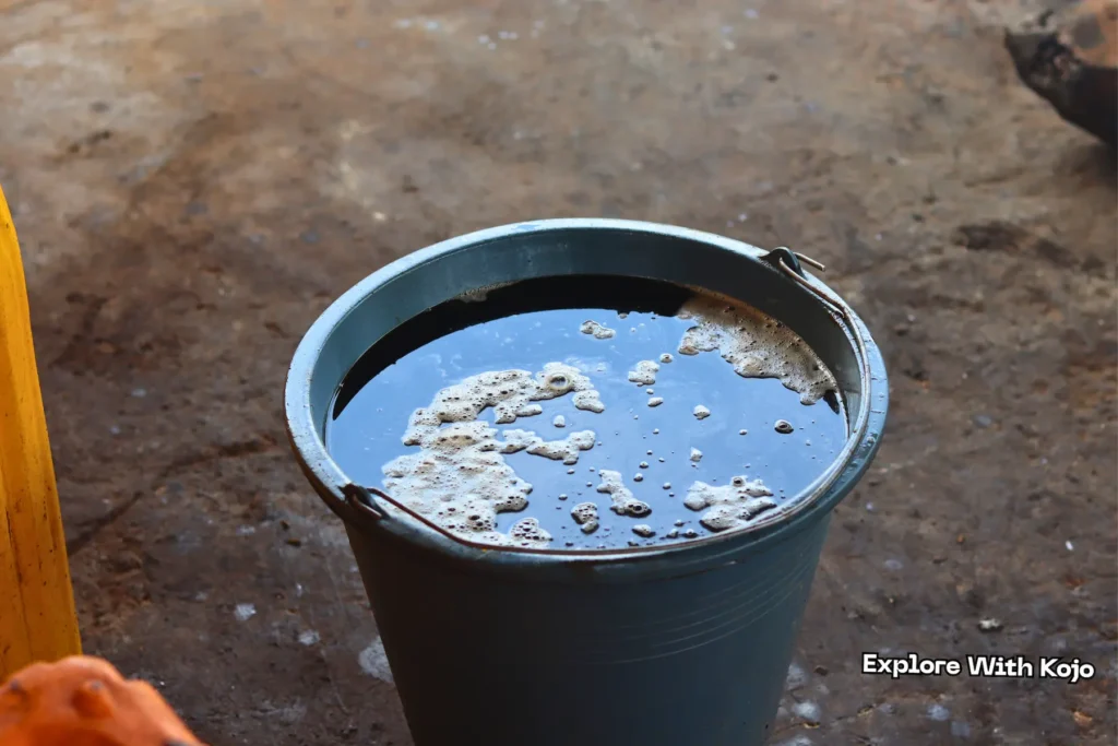 Potash water solution made from cocoa pod ash in Tamale, Ghana