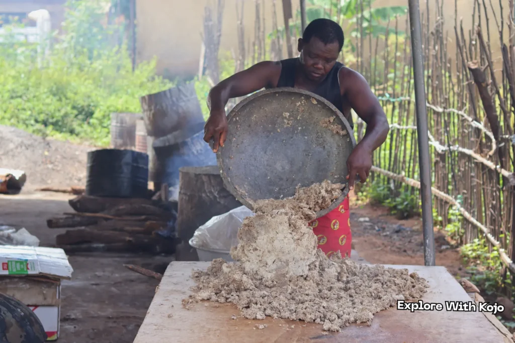 African black soap being poured and spread out for drying in Tamale