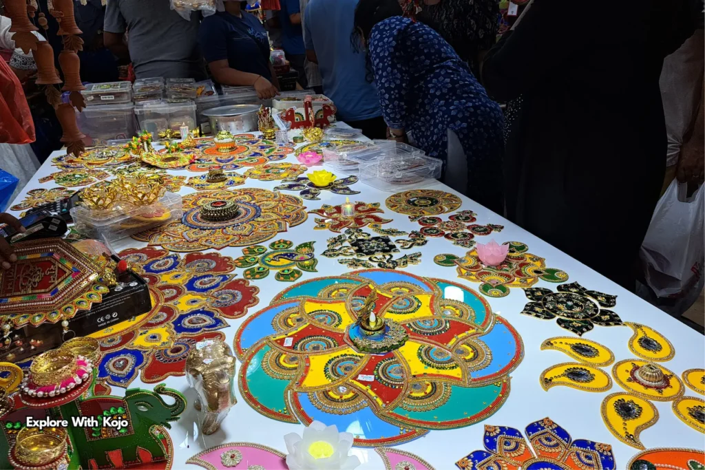 Table full of colorful rangoli and Diwali decorations in Little India Singapore