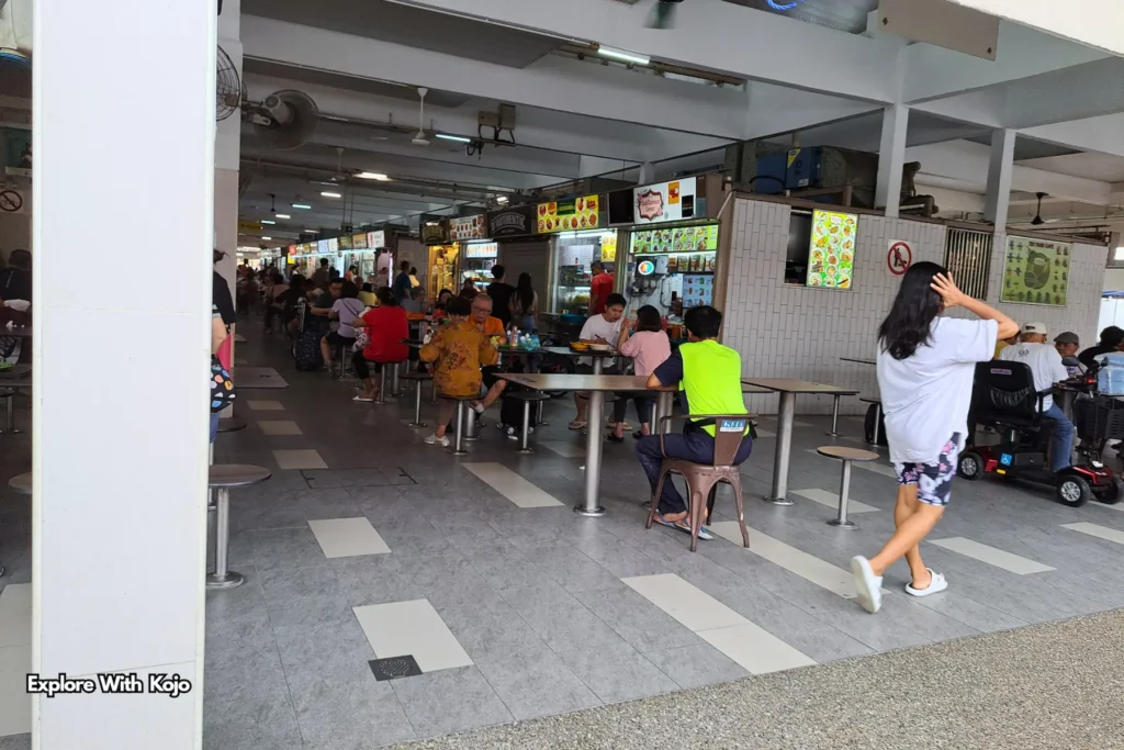 Covered communal seating area next to the Pasar Malam.