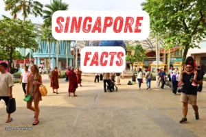 People walking at Resorts World Sentosa in Singapore with “Singapore Facts” text overlay