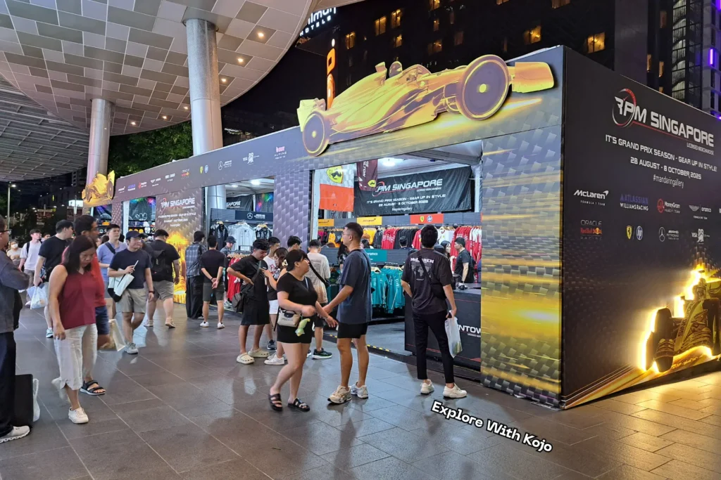 Formula 1 Singapore Grand Prix pop-up store on Orchard Road with fans buying merchandise
