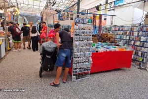 Shoppers at an accessories stall in a Singapore Pasar Malam.