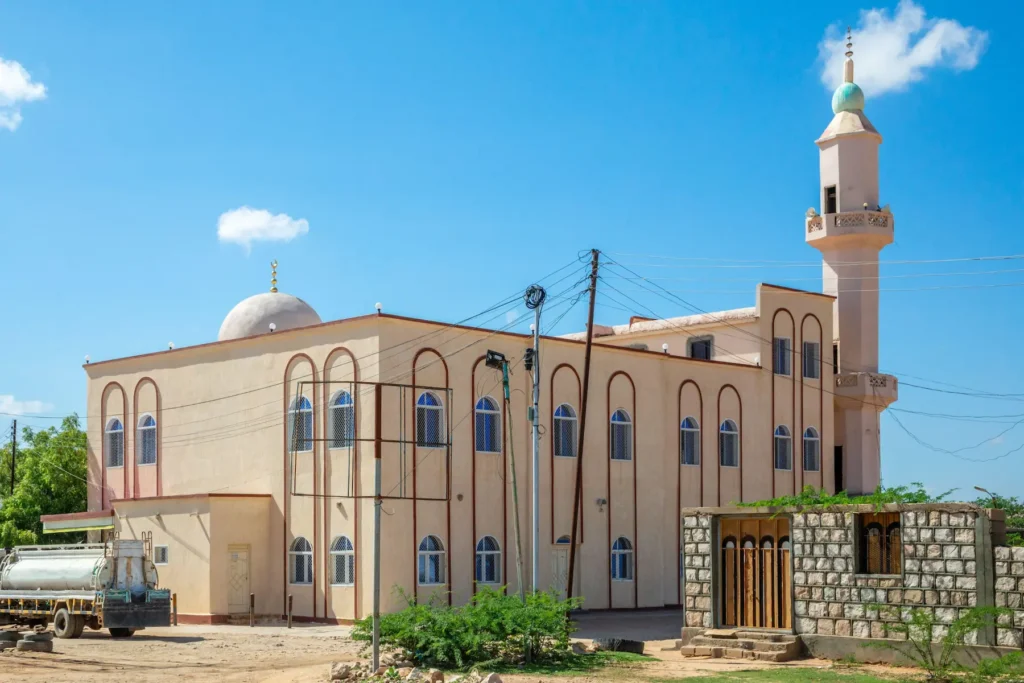 Mosque building in Mogadishu, Somalia under a clear blue sky.