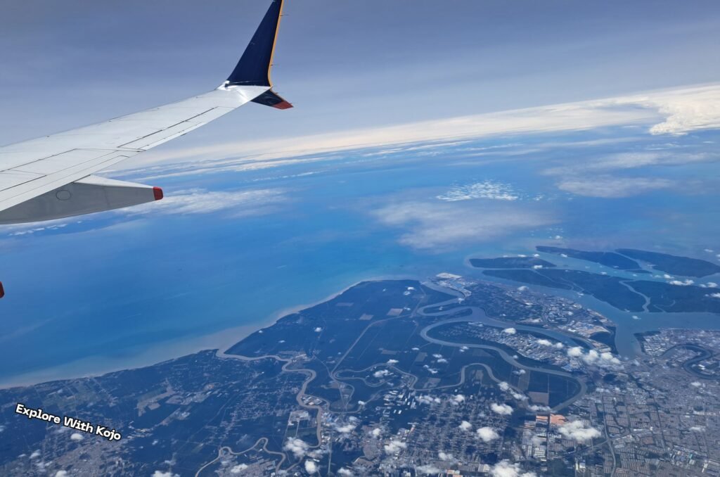Aerial view from the plane window while flying from Singapore to Penang