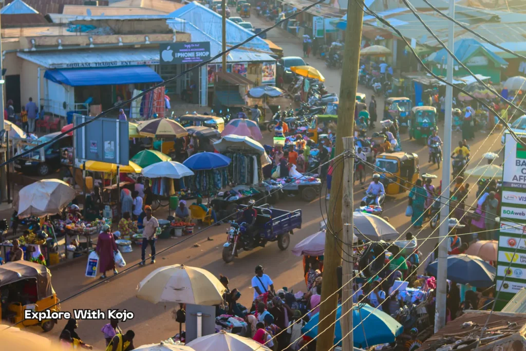 Traders selling goods in a busy section of Tamale market