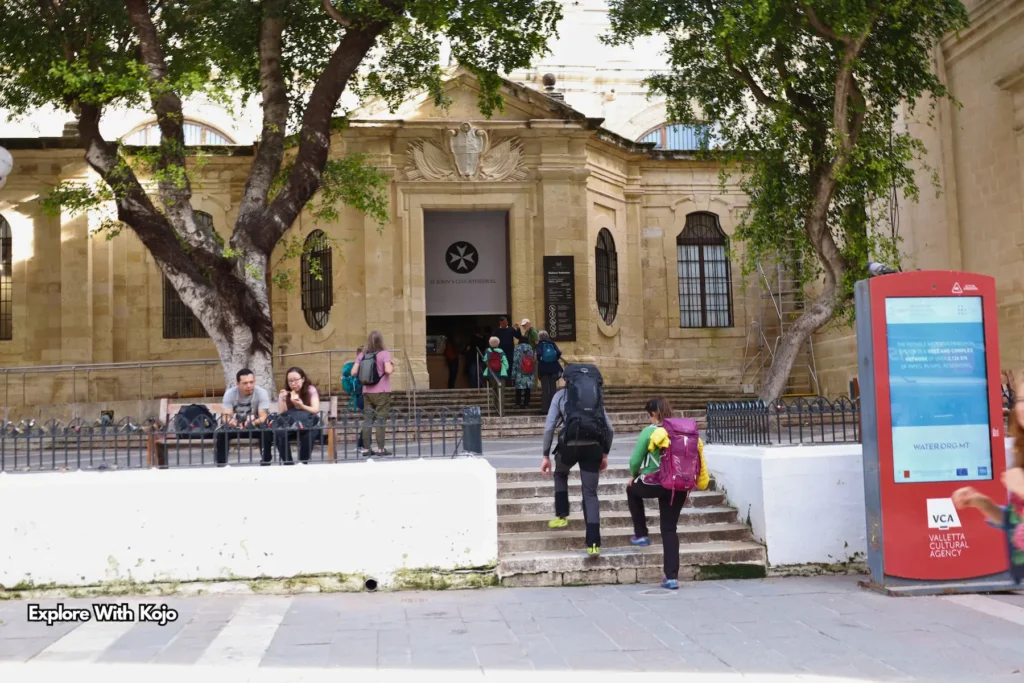 Visitors at a museum entrance in Valletta