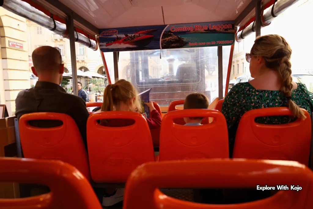 Passengers seated inside the Valletta trackless train