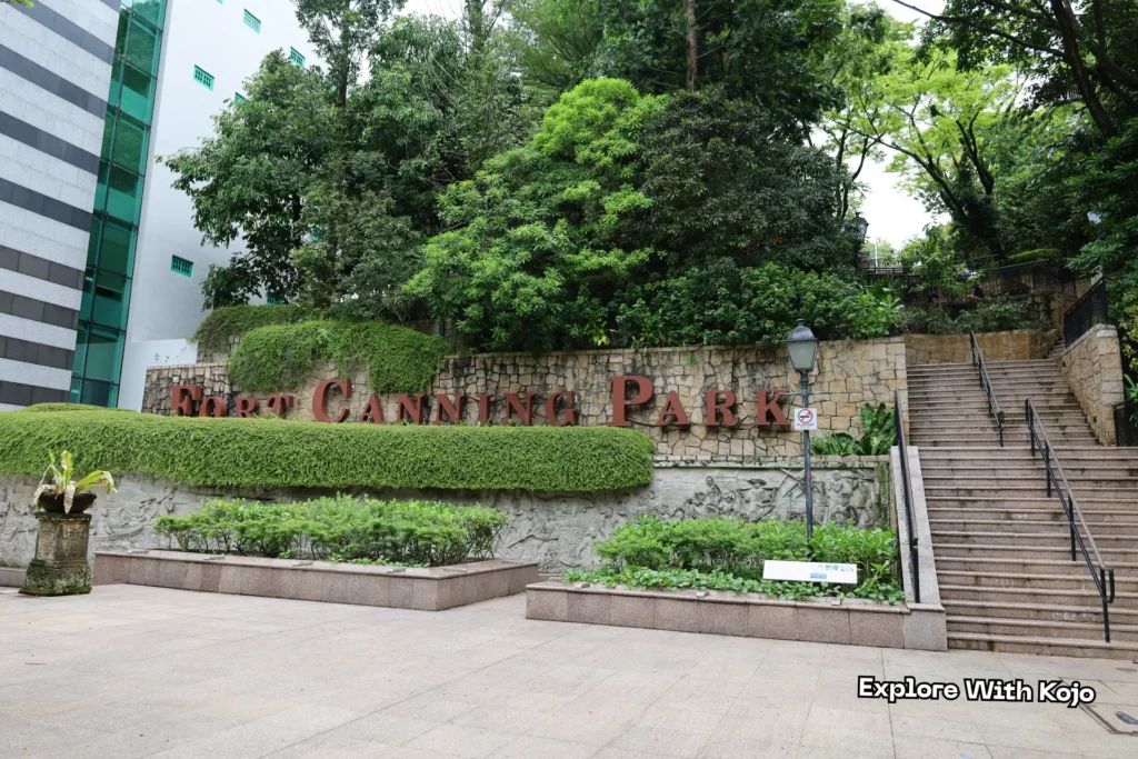 Entrance to Fort Canning Park near Clarke Quay, surrounded by lush greenery and stone steps leading into one of Singapore’s most historic parks.