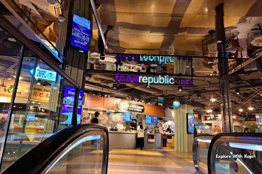 Escalators leading to the upper shopping floors at Wisma Atria