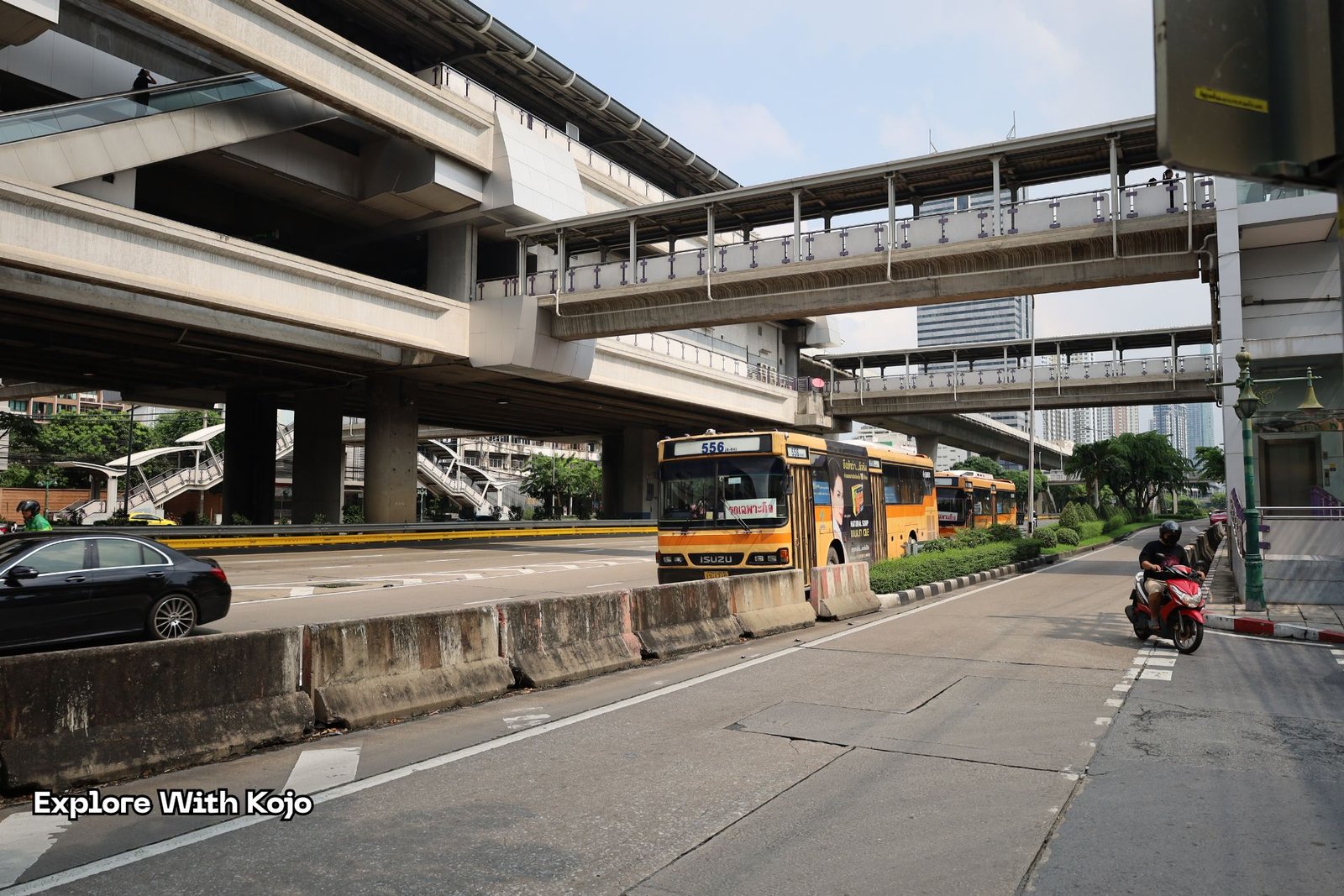 Overhead pedestrian bridge linking to the BTS Skytrain in Bangkok.