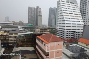 Bangkok city buildings and high-rise structures on a cloudy day, illustrating the urban environment where visitors often ask about earthquake safety in Thailand.