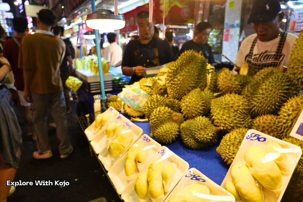 Fresh durian displayed at a Chinatown stall on Yaowarat Road.