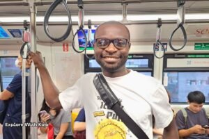 Kojo riding the BTS Skytrain for the first time in Bangkok.