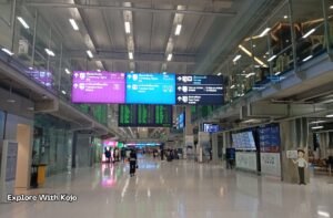 Interior of Suvarnabhumi Airport in Bangkok showing immigration and arrivals signage, used to illustrate Thailand’s updated visa rules for 2025.