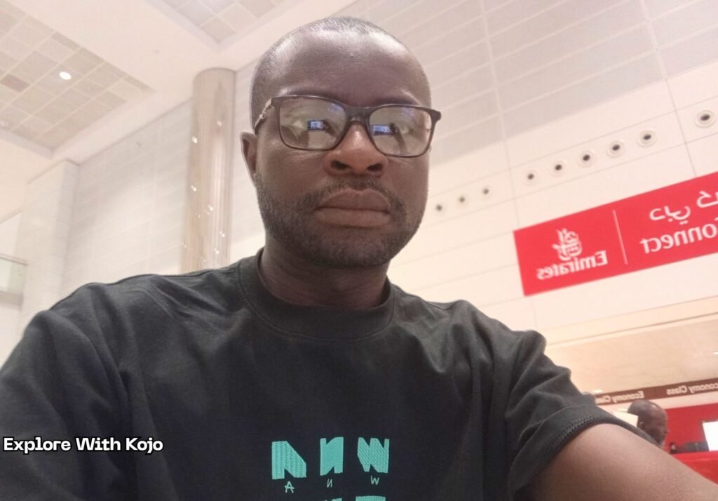 Kojo Enoch waiting at the Emirates Dubai Connect desk for visa processing after missing his connecting flight to Bangkok