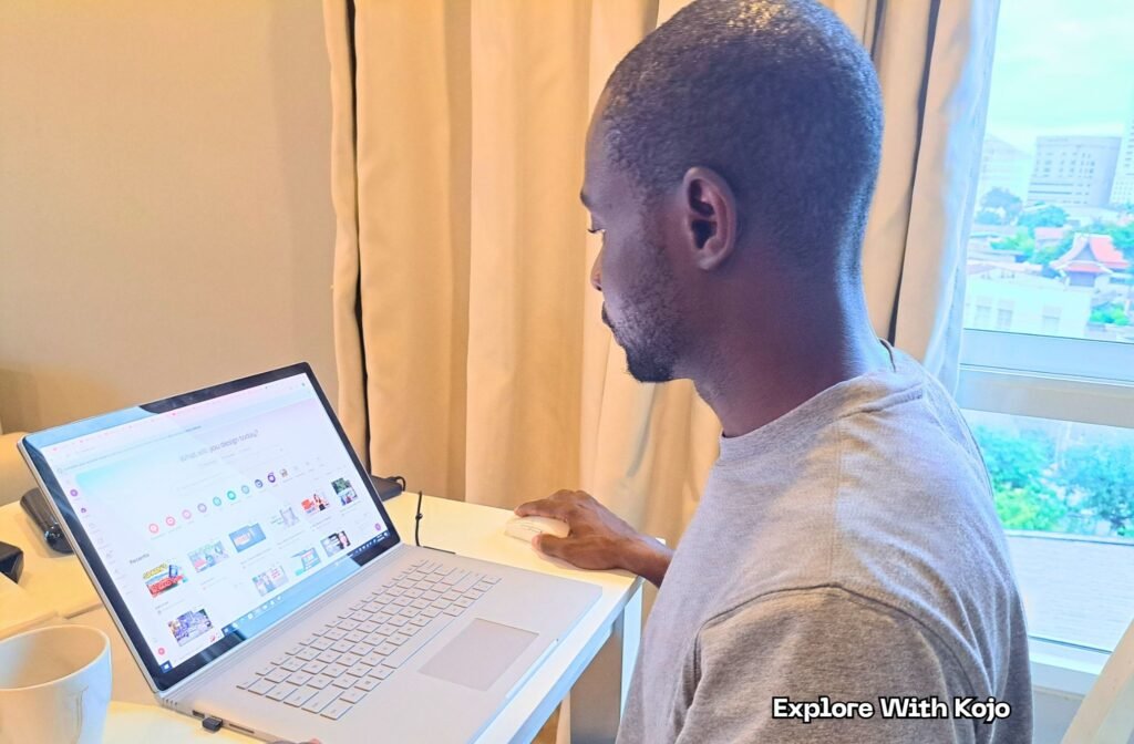 Digital nomad Kojo working on his laptop while researching travel and visa topics. 