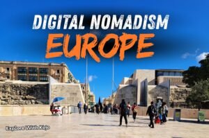 Entrance to Valletta, Malta with people walking under clear blue skies, used as a featured image for a Europe digital nomad visas guide.