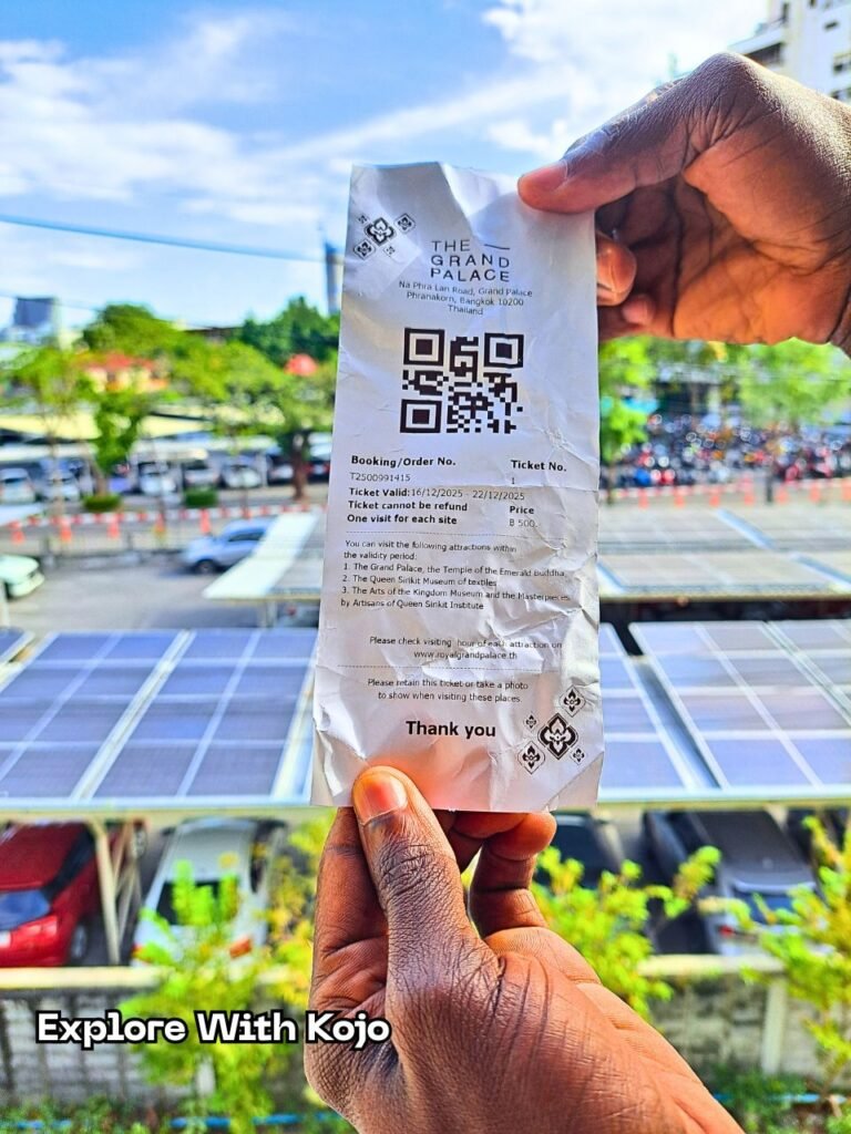 Official ticket to the Grand Palace in Bangkok held by a visitor